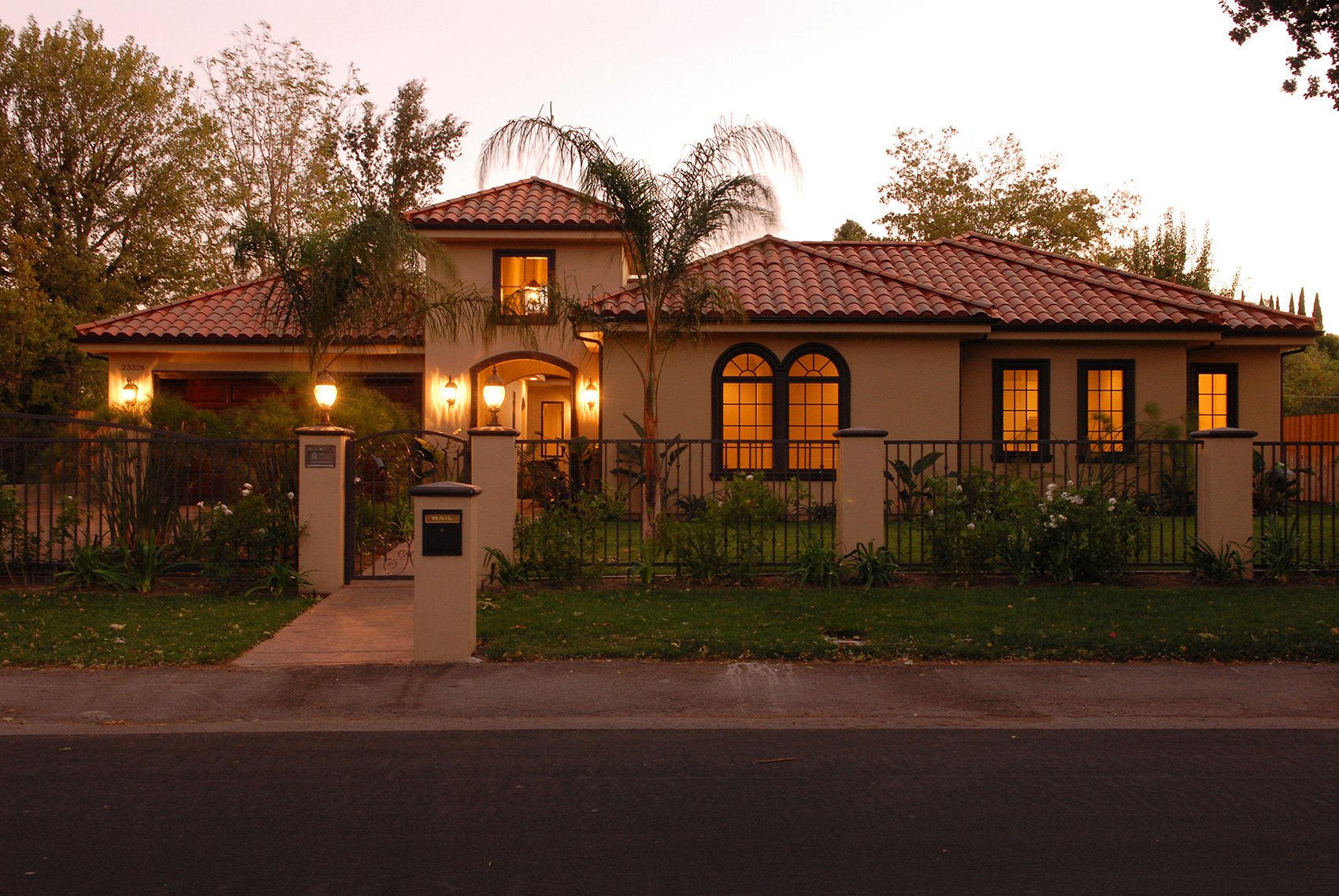 Exterior of a luxury custom home at dusk